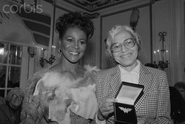 14 Nov 1984, New York State, USA --- Original caption: Civil Rights activist Rosa Parks, (R), of Detroit shows off the Wonder Woman Foundation's special 1984 Eleanor Roosevelt Woman of Courage Award presented to her on November 14, 1984. At left is actress Cicely Tyson who presented the award. Parks was honored for her work in the Civil Rights movement. --- Image by © Bettmann/CORBIS